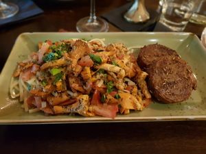 Linguine and chanterelles with herbs of Provence and seitan medaillons at Försters in Berlin