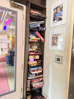 Game shelf with big selection of games  at Manny's in San Francisco