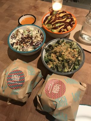 From top: Messy Fries, Cauliflower Waldorf Salad, Broccolini Caesar, Lekka Cheeseburger, Guacamole Burger.  at Lekka Burger in New York City