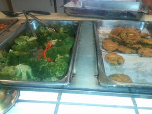 Sunday brunch buffet. Broccoli with peppers & onions, vegan sausage patties. Good patties. Broccoli over cooked, tasty yet borderline soggy. at Soul Vegetarian - South in Atlanta
