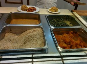 Lunch buffet rice, gravy, yams, greens.  at Soul Vegetarian - South in Atlanta