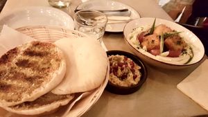 TLV eatery’s special hummus with fried polenta on top   at TLV Eatery in Budapest