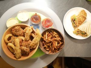 Fries and bucket with nuggets, onion rings and friend "cheese" at Végéman in Strasbourg