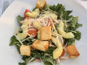 Baby Kale Panzanella Salad at Faro Blanco Restaurant in Noord