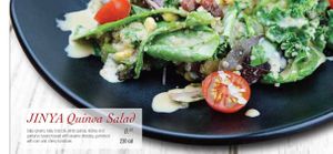 JINUA Quinoa Salad: baby greens, kale, broccoli, white quinoa, kidney and garbanzo beans tossed with sesame dressing, garnished with corn and cherry tomatoes at JINYA Ramen Bar in Santa Monica