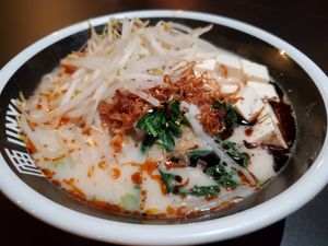 Spicy creamy ramen with added sprouts at JINYA Ramen Bar in Santa Monica