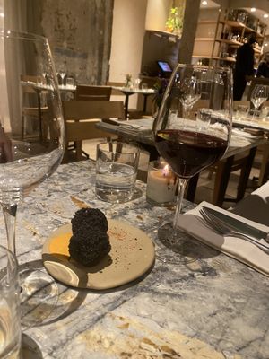 Black rice ‘bitterbal’ with vegan cheese inside  at MESA Restaurant in Paris