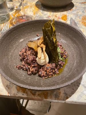 "Land and Sea" - Black rice, smoked almond butter, oyster mushrooms, crispy dulse, creme fraiche, demi-glace & kombucha chmichurri at MESA Restaurant in Paris