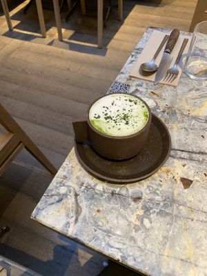 Matcha latte w/ almond milk   at MESA Restaurant in Paris