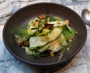 Courgette (zucchini) ceviche, a raw salad as the main course at MESA Restaurant in Paris