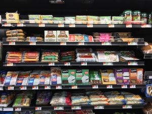 Refrigerated case in produce section at Market Basket in Claremont