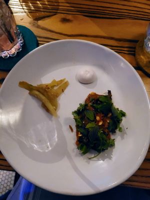 Second course: watermelon rind kimchi, coconut cream, Thai mushrooms with peanuts at Southern Belle in Atlanta