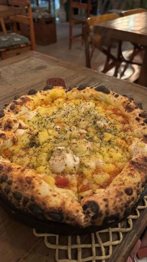 Three-cheese pizza (all vegan) at Forno e Flora in Ubatuba