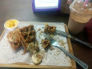 Waffle with peanut butter, chia seeds, flax, hemp hearts and bananas with pineapple on the side; Dark Knight Shake at Vegan Town in Johnson City