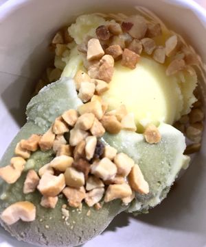 Matcha and mango ice cream topped with roasted peanuts at Sangkaya in Kuala Lumpur