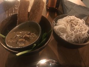 Satay skewers and rice noodles  at TA Vegan House in Hamburg