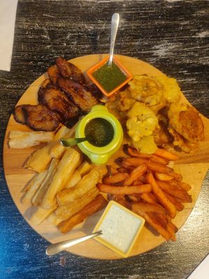 Vegan sharing starter - yucca fries, sweet potato fries, and two types of plantain. Sauces were all very tasty! at L'Arepa in Bordeaux