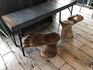 Love the quirky feet chairs.  at Strive Foods in Sandy Springs