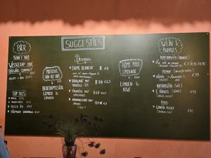 Board on wall with suggestions at Amour in Ghent
