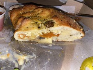     Vegan calzone with vegan pepperoni   at Spak Brothers in Pittsburgh