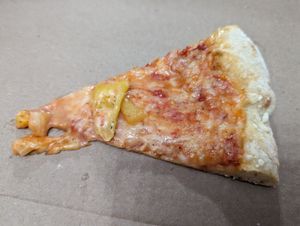 Vegan pizza extra cheese, pineapple and banana peppers at Spak Brothers in Pittsburgh