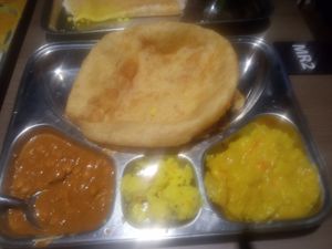 Puri set with upama(semolina) added as Christmas eve at Rathana Bhavan in North Singapore