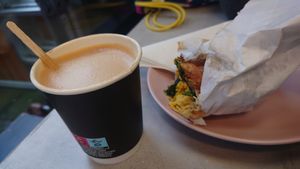Scrambled tofu wrap and cappuccino at It's a Trap in Dublin
