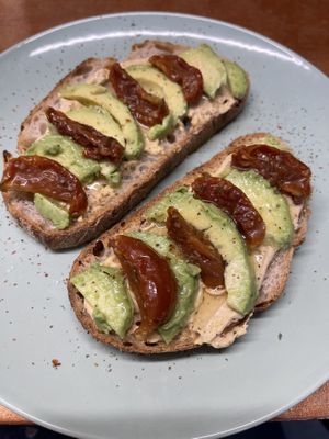 Sourdough with Tomato, Hummus, Avo and Chilli  at Ethos Brothers in Brentwood