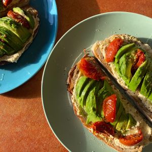 The 'Ethos Brothers Special' Toasted Sourdough topped with Organic Hummus, Slow Oven-Roasted Tomatoes, Avocado, Extra Virgin Olive Oil, Chilli & Sea Salt.  at Ethos Brothers in Brentwood