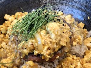 Loco Moco - Beyond burger patty, tofu scramble, mushroom & Maui onion gravy on a bed of fluffy rice. So nice!  at Salt & Pepper Cafe in Honolulu