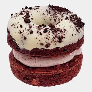 Red Velvet doozie with double red velvet donuts and our own secret recipe marshmallow topped with white chocolate at The Naked Vegan in Cardiff