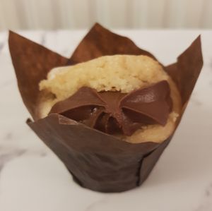 Our mouth-watering Chocolate Chip Muffin topped with Chocolate buttercream are packed with chocolate, topped with chocolate-infused buttercream. at The Naked Vegan in Cardiff