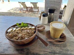 Playgrounds smoothie bowl & dirty turmeric latte with coconut milk   at Ombak Zero Waste Cafe in Lembongan