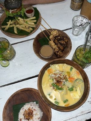 Vegan curry, burger and satay sticks.  at Ombak Zero Waste Cafe in Lembongan