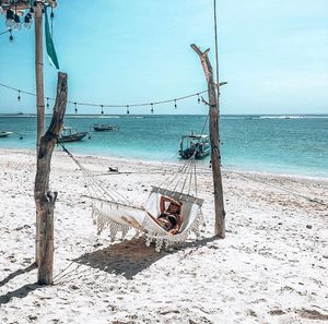 Chilling on the beach  at Ombak Zero Waste Cafe in Lembongan
