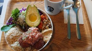 Buddha bowl and milk tea at Optimus Cafe in Osaka
