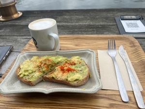 Avocado on toast with oat cafe lattee  at Optimus Cafe in Osaka