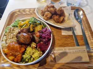 Seasonal Buddha bowl and side of fried soy meat at Optimus Cafe in Osaka