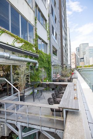 Riverside seats at Optimus Cafe in Osaka
