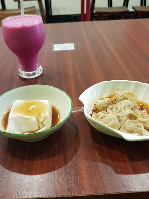 Left: peanut tofu; right: "meat" dumplings at Luz Vegan in Chiayi
