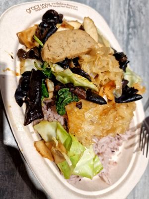Mushroom stir fry with rice at So Vegan - Yaowarat​ in Bangkok