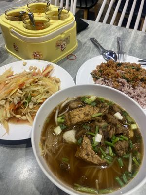 Mushroom tofu soup, papaya salad and mixed pork less meat  at So Vegan - Yaowarat​ in Bangkok