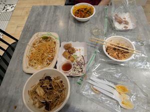 Pad Thai, Ginger salad and Spring Rolls (plus other stuff from a stall outside) at So Vegan - Yaowarat​ in Bangkok
