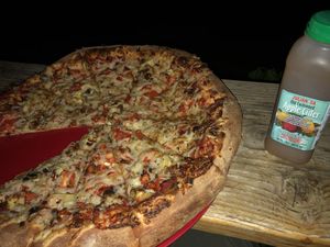 Create your own pizza (soyrizo, mushroom, artichoke, cherry tomato, vegan cheese) and a cold cider    at Julian Beer Co. in Julian