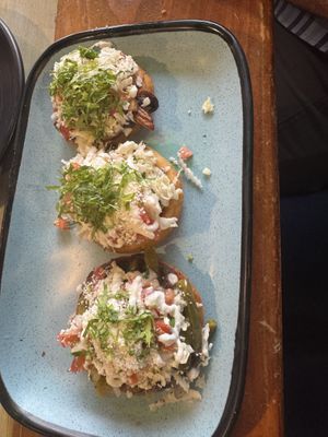 Sopes, cactus, mushroom, and vegetable. Make sure to ask no cheese or sour cream. I forgot and scraped it off. I did tell them I’m vegan.  at Tamale Company in Orlando