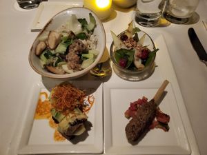 Clockwise: Thai basmati rice, pear salad, kafta, and forbidden roll. at Walt Disney World - California Grill in Lake Buena Vista