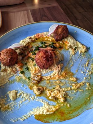 Falls Family Falafel
A secret recipe of Chickpeas, Garlic, Onions, Lemon Juice, and Herbs served with House-made Edamame Hummus and Toasted Pumpkin Seeds  at Walt Disney World - Jungle Navigation Co Skipper Canteen in Lake Buena Vista