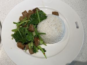 Kale with crispy plant-based meat and rice, 119 baht  at Sook Sathorn - Silom in Bangkok