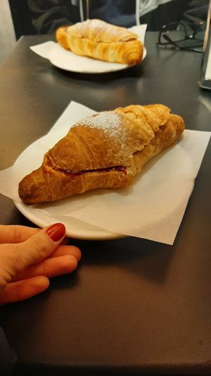 Vegan croissant with jam at Zebu in Bologna
