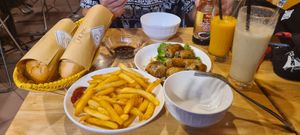 Bahn mi, fries and fried spring rolls at Huong Viet in Hanoi